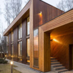 Fachadas de madera en casas de dos pisos