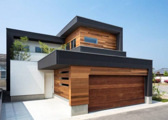 Casas con toques en negro y madera